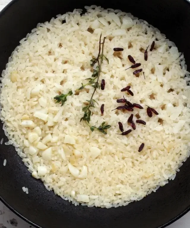 rice on black ceramic bowl