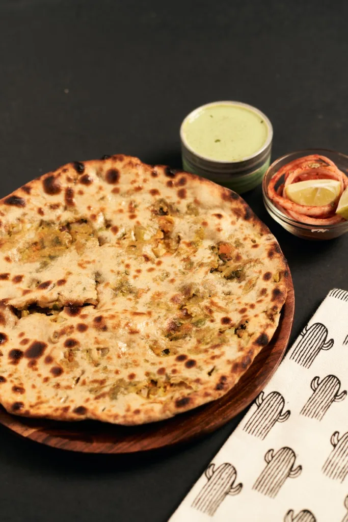 paratha Flatbread with Cheese on Wooden Plate