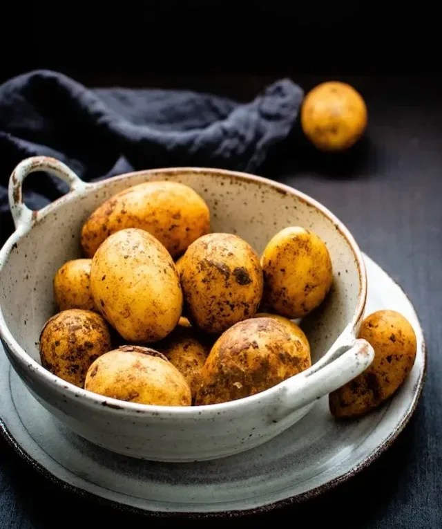 potatoes in brown on table